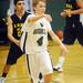 Greenhills sophomore Emmet Kulka passes the ball to a teammate during the first half at Greenhills on Thursday. Melanie Maxwell I AnnArbor.com